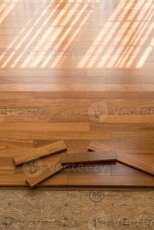 Installation of brazilian cherry hardwood flooring in room photo