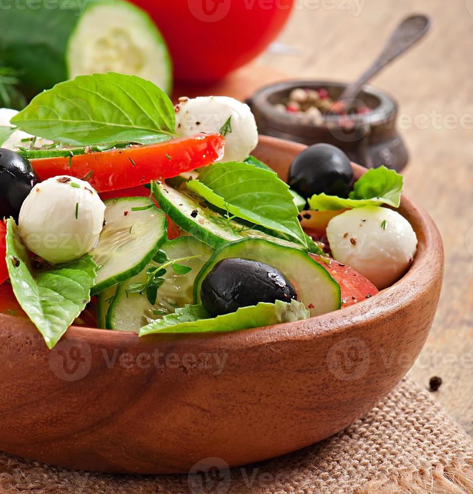 Fresh vegetable greek salad, close up photo