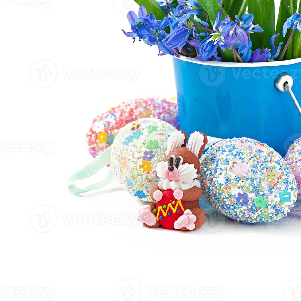 Colorful Easter eggs in a basket on a white background photo