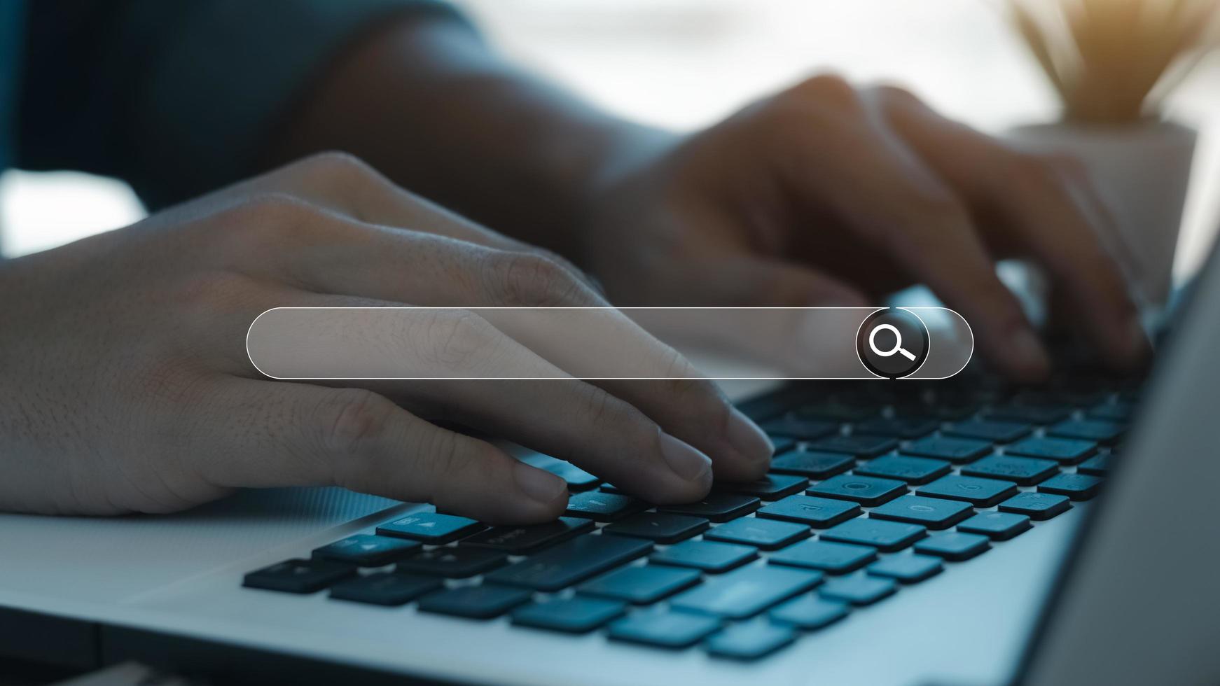 Searching Browsing Internet Data Information with blank search bar.businessman working with smart phone, tablet and laptop computer on desk in office. Networking Concept. photo