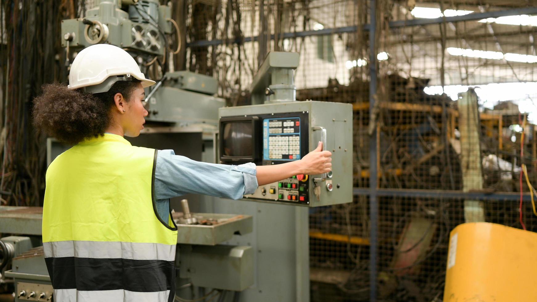 Female chief mechanical engineer work in a mechanical factory photo