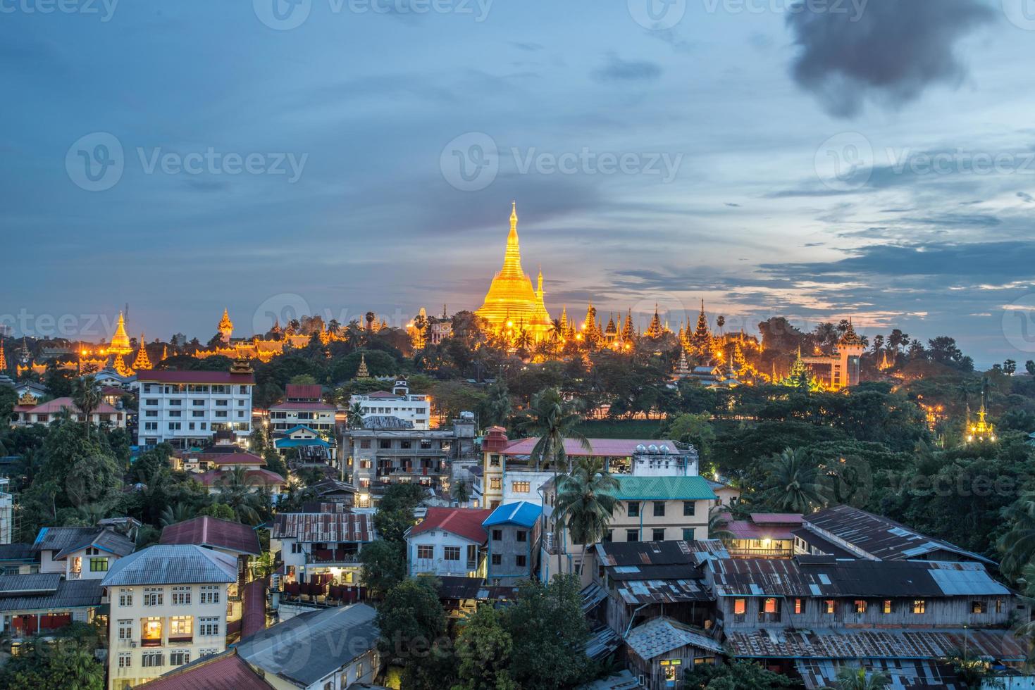 Beautiful view of Shwedagon pagoda the most tourist attraction in Yangon township of Myanmar at night. photo