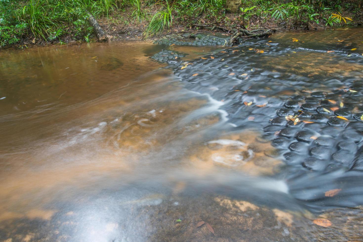 Kbal Spean waterfall the mystery place of ancient Khmer empire in Siem Reap, Cambodia. photo