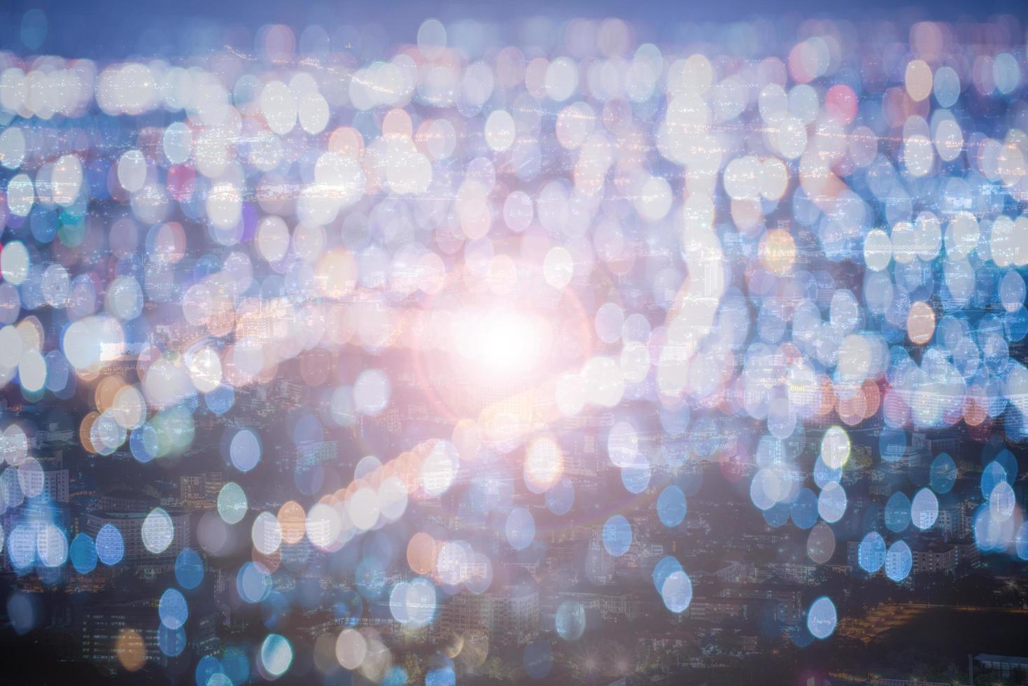 Blurred city and bokeh abstract background with light flare. photo