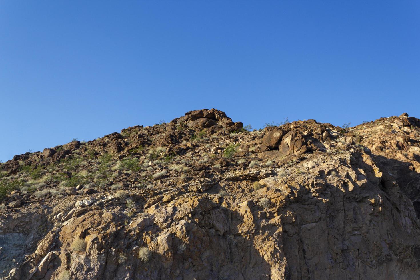 Small Mountain Rock Formation in Arizona on a beautiful day. Selective focus. photo