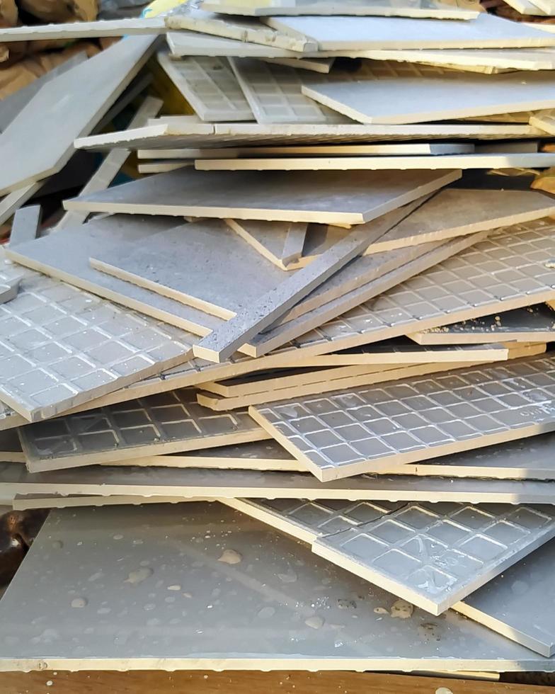 One pile of tile fragments. Tile fragments at the construction site. photo
