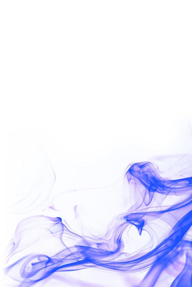 Blue smoke on white background photo