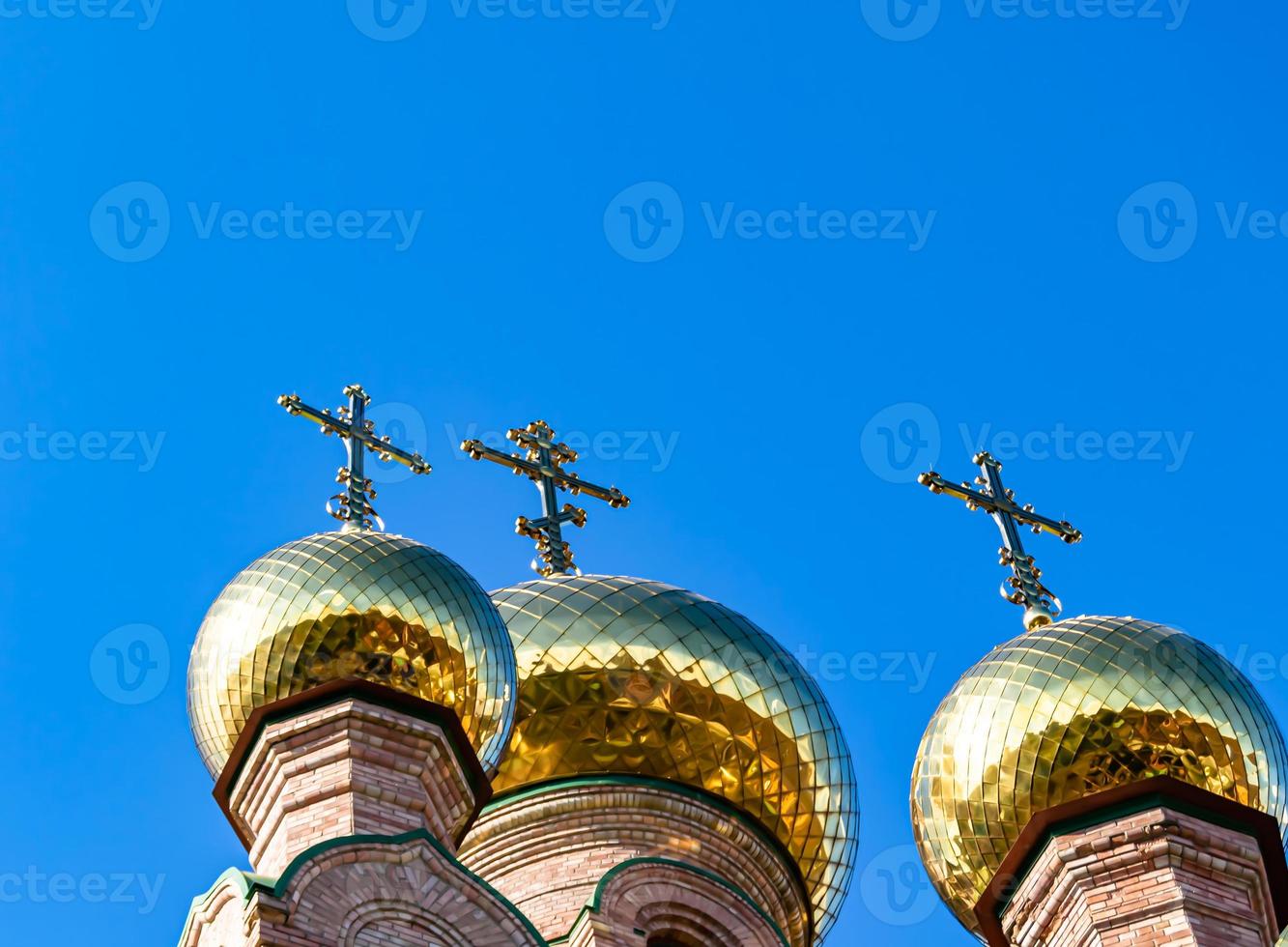 Christian church cross in high steeple tower for prayer photo