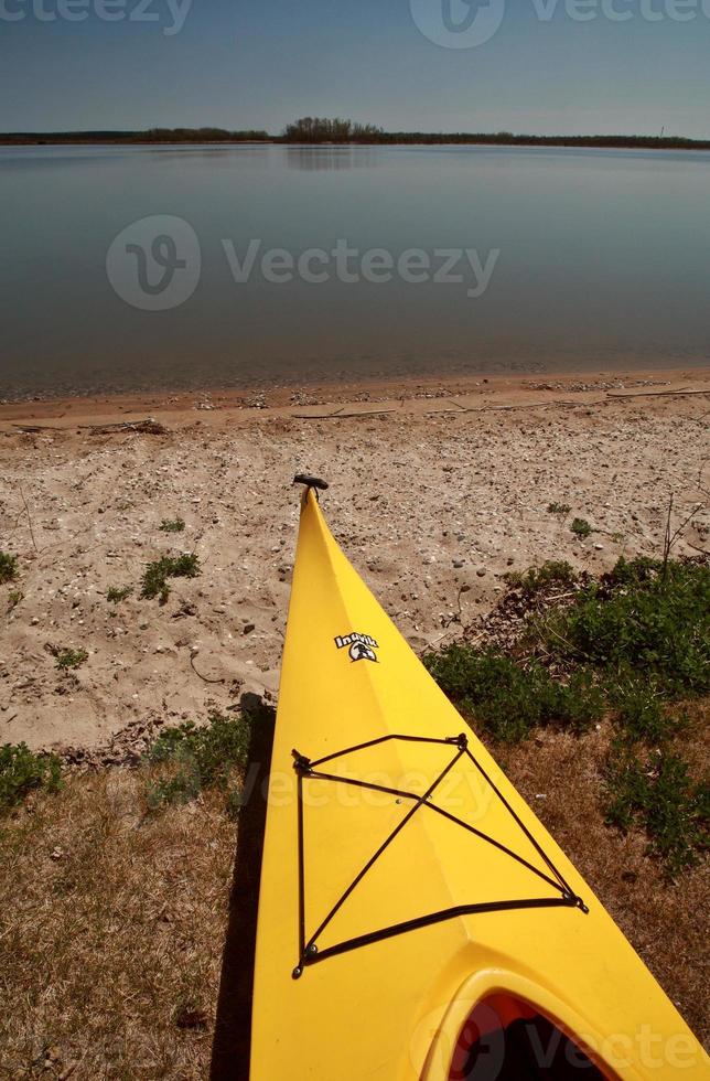 Kayak on beach at Lake Winnipeg photo