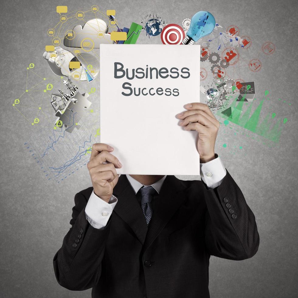 businessman hand show book of success business photo