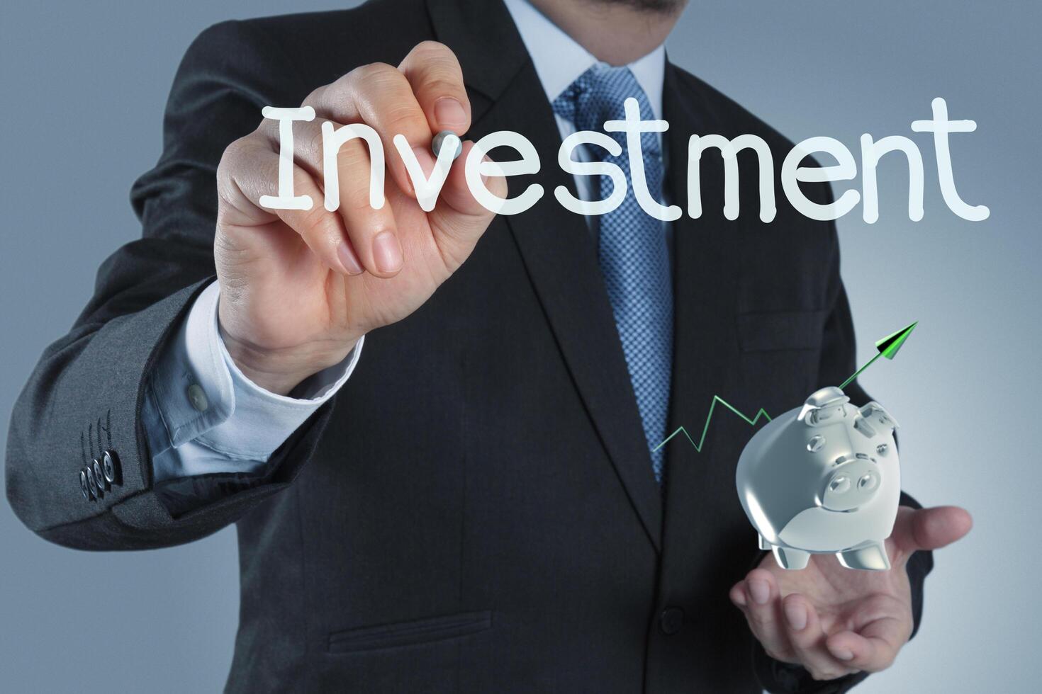 businessman  pointing to investment concept photo