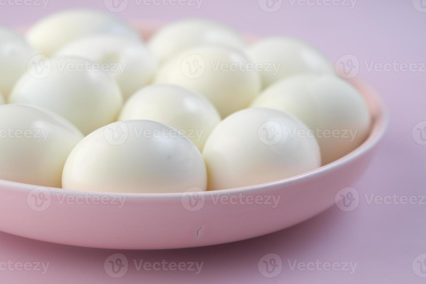 close up of bowel egg in a bowl on table photo