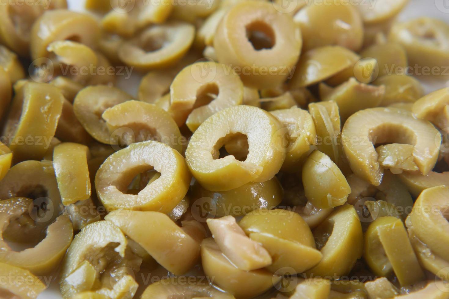 slice of olive in a bowl close up photo