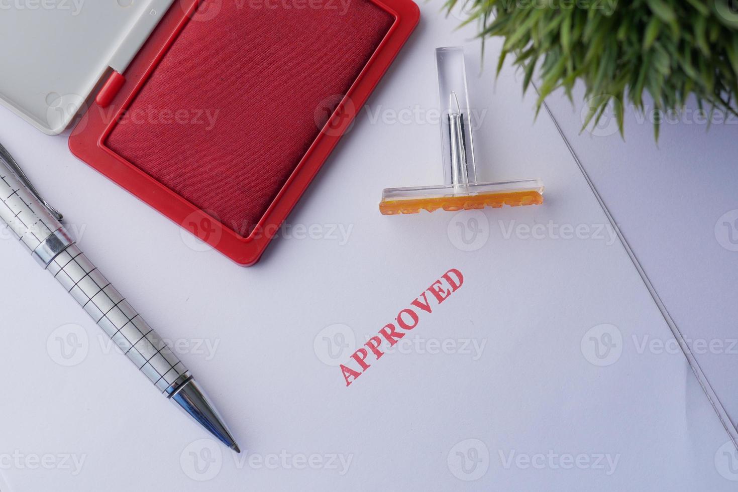 Stamping Document with Approving Contract close up photo