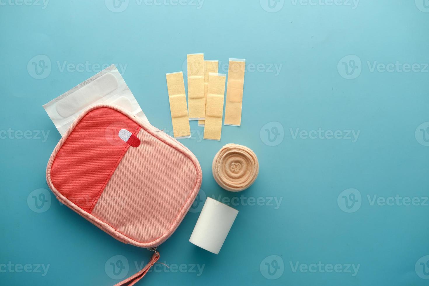 adhesive bandage and a bag on table photo
