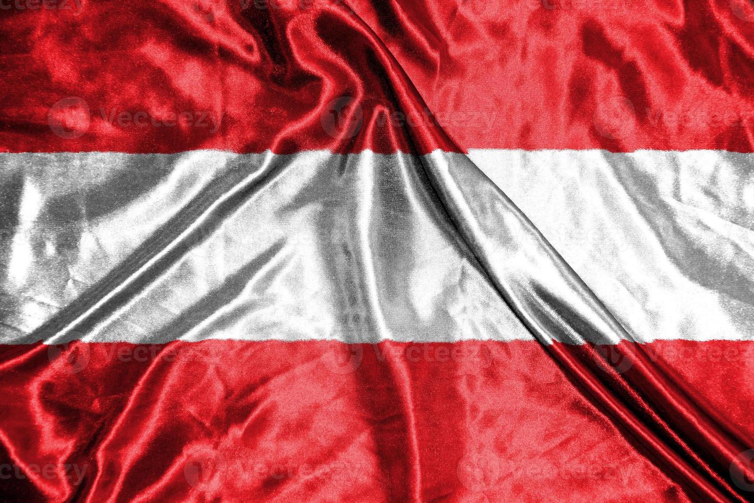 austria cloth flag Satin Flag Waving Fabric Texture of the Flag photo
