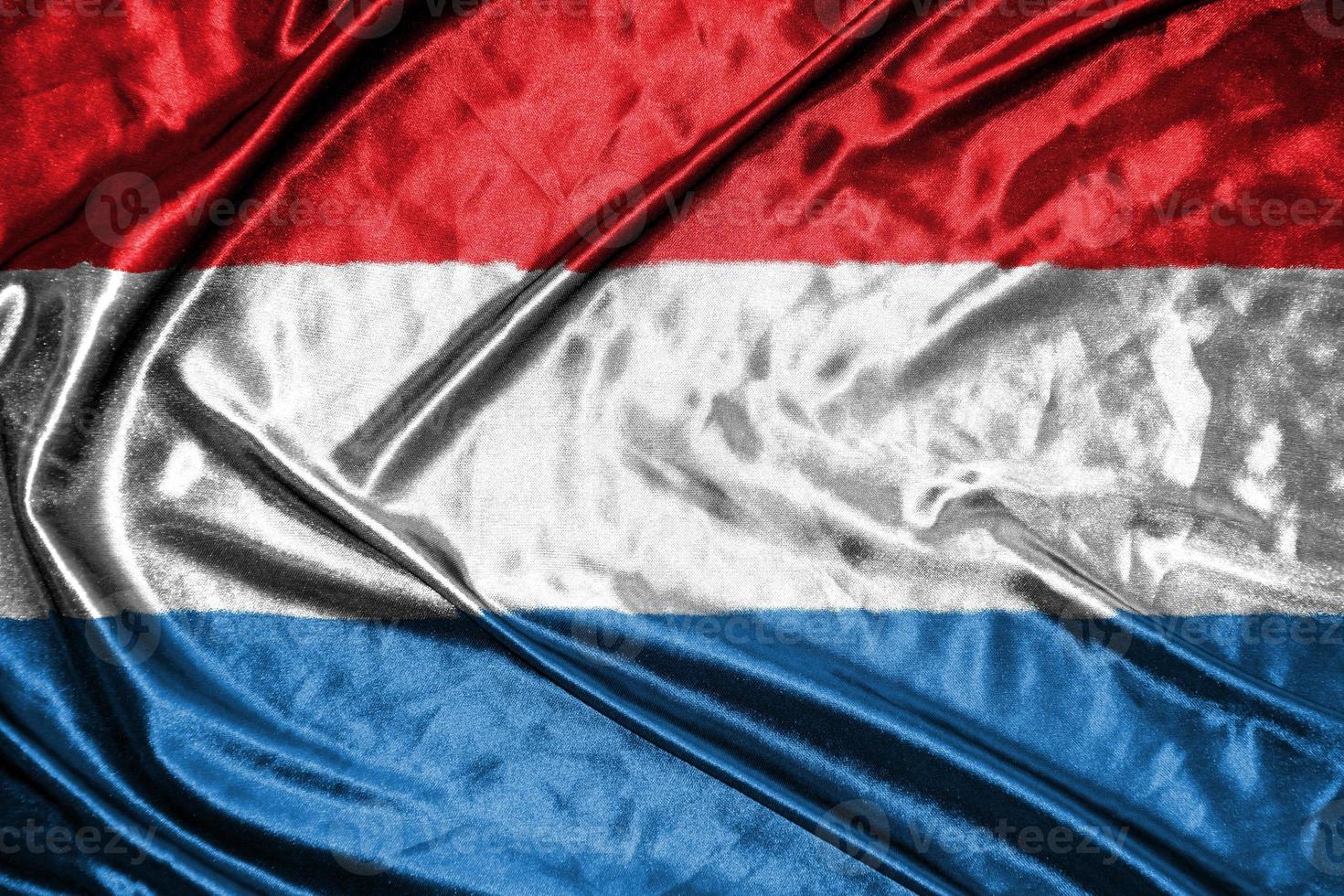 luxembourg cloth flag Satin Flag Waving Fabric Texture of the Flag photo