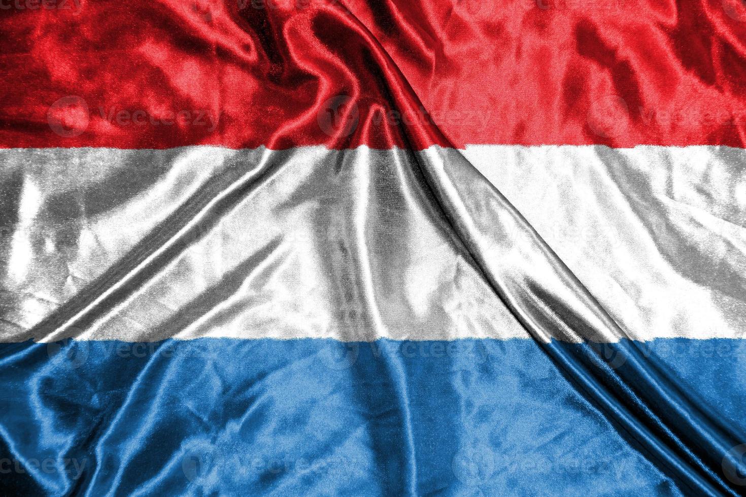 luxembourg cloth flag Satin Flag Waving Fabric Texture of the Flag photo