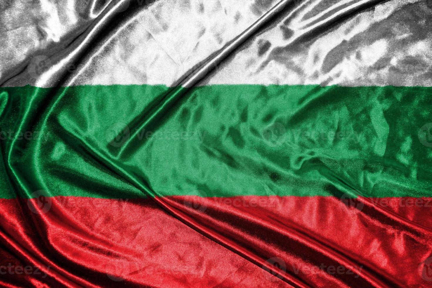 bandera de tela de bulgaria bandera de satén ondeando la textura de la tela de la bandera foto