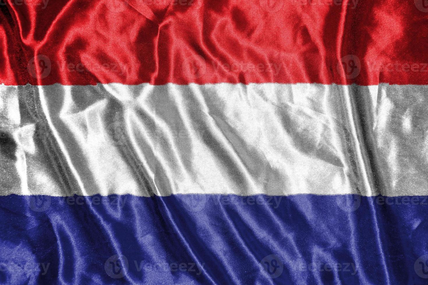 netherland cloth flag Satin Flag Waving Fabric Texture of the Flag photo