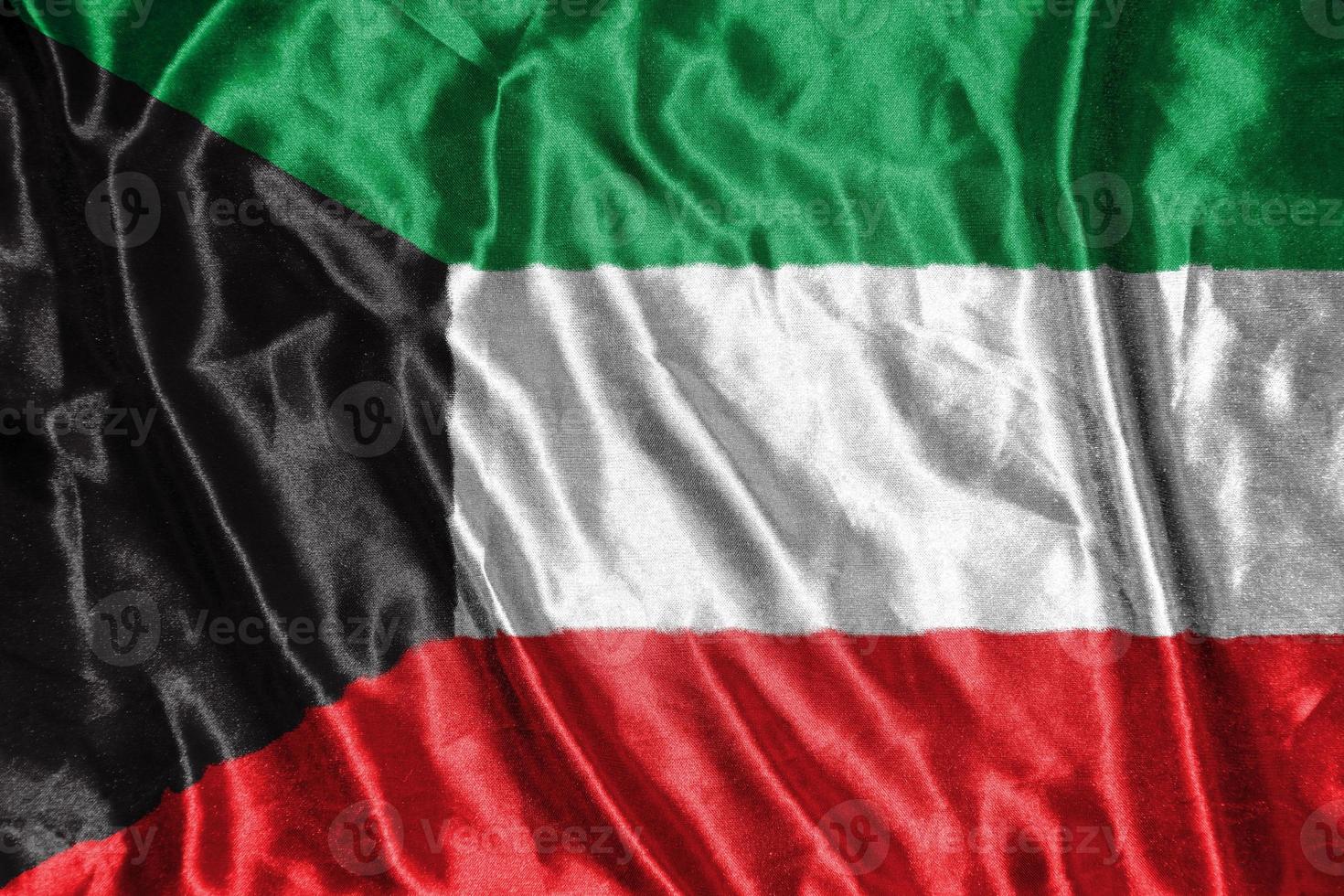 bandera de tela de kuwait bandera de satén ondeando la textura de la tela de la bandera foto