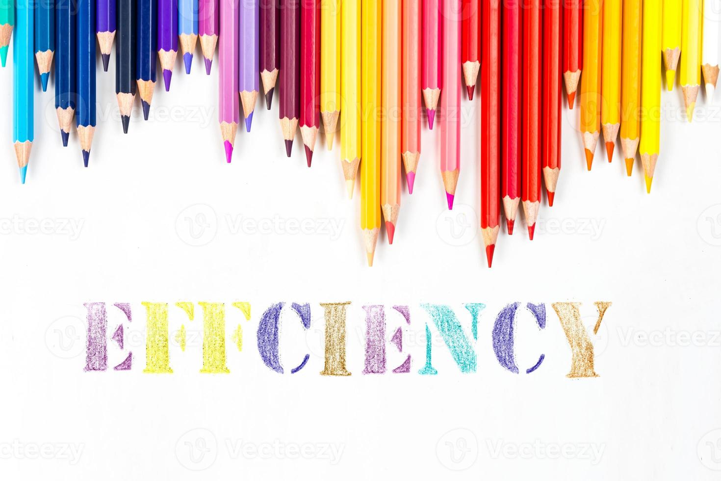 Multi-colored wooden sticks Wooden colouring pencils and Effciency on white background photo