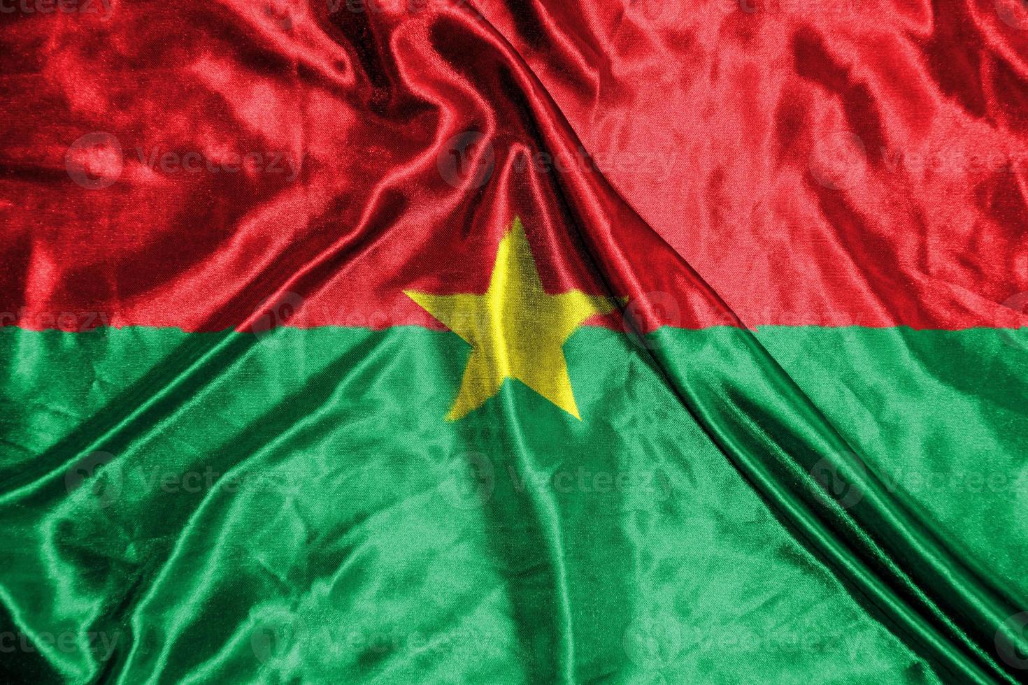 burkina cloth flag Satin Flag Waving Fabric Texture of the Flag photo