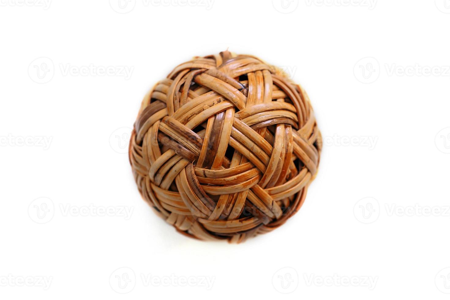 rattan ball or takraw with white background, popular kick sport in south east asia photo