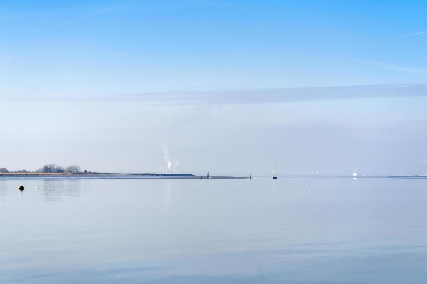 View of the River Swale from Harty Island Kent on a Tranquil Win photo