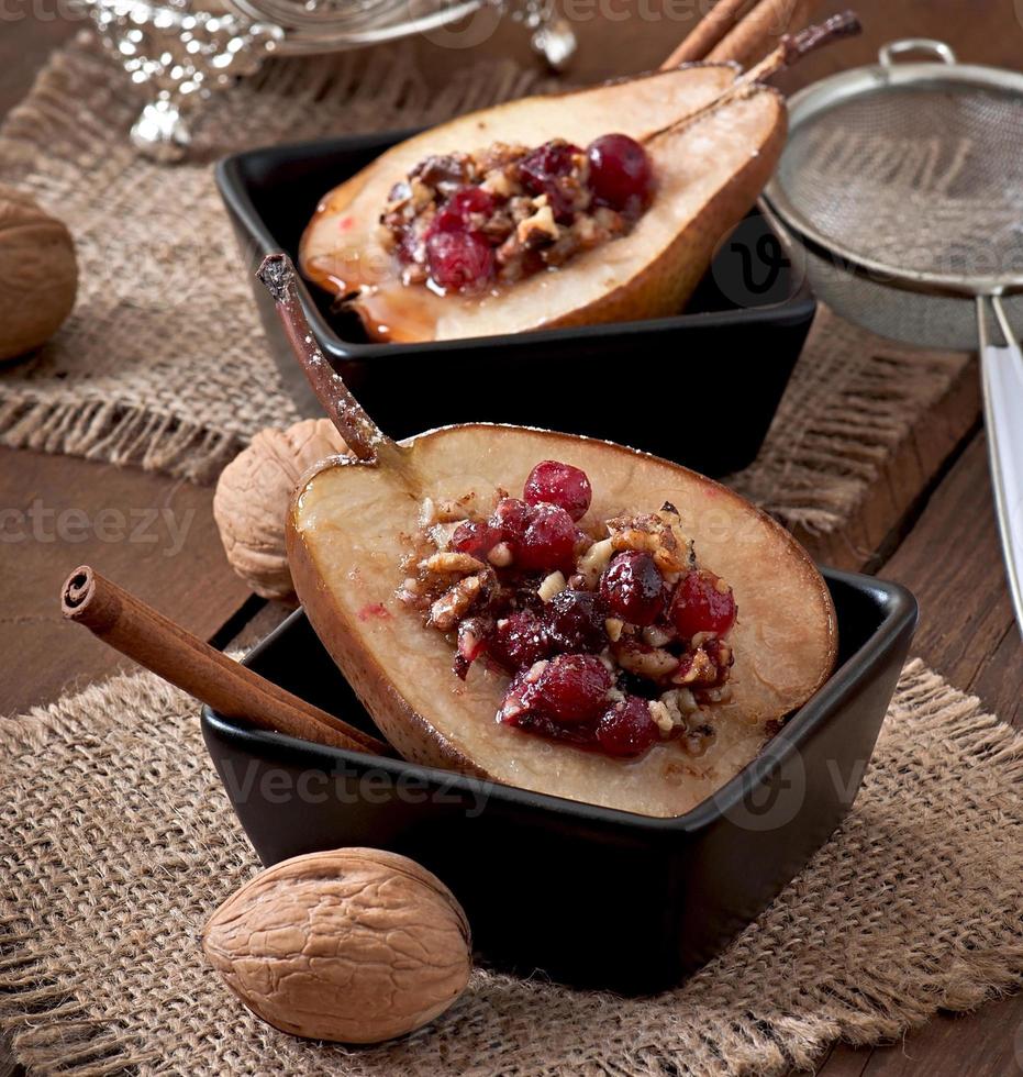 Baked pears with cranberries, honey and walnuts photo