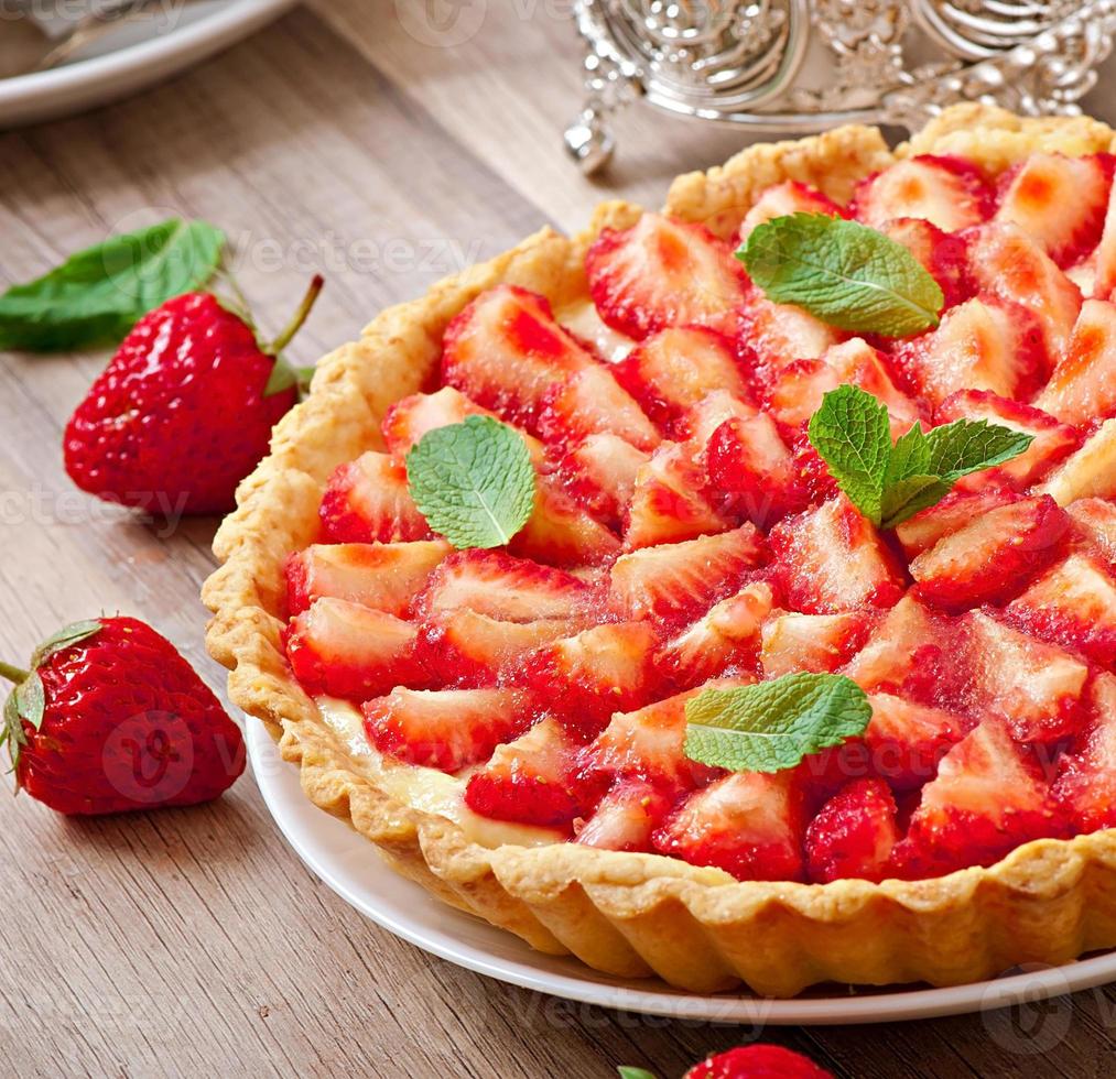 Strawberry tart with custard photo