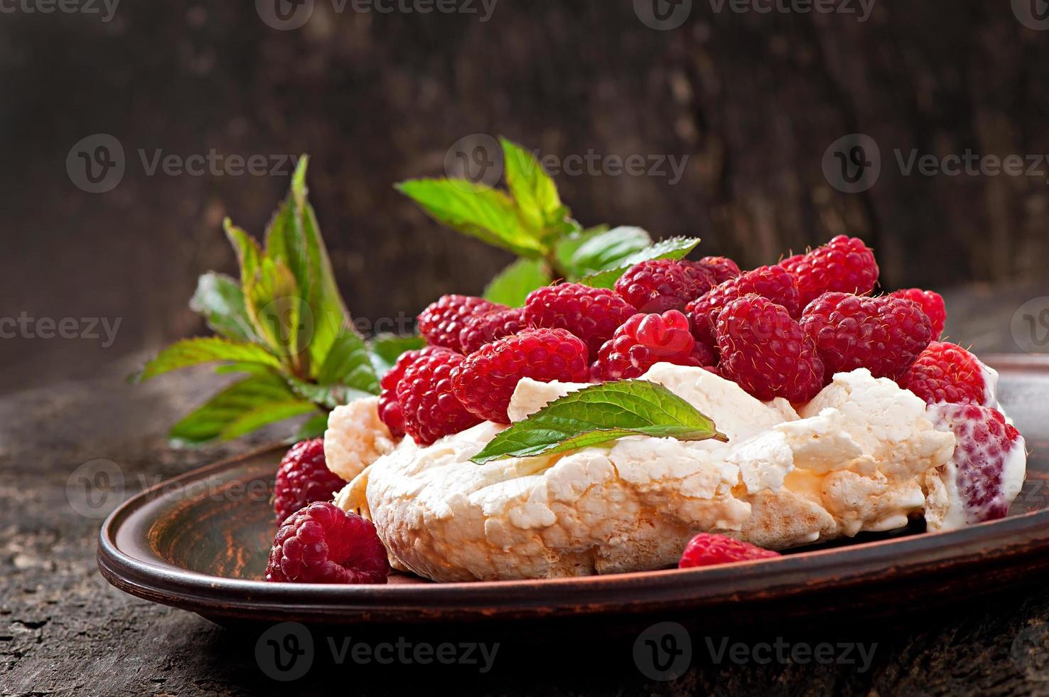 Cake Pavlova with cream and berries photo