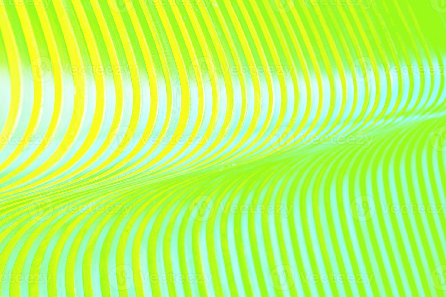 Curved wooden bright green slats. Abstract background. Decorative design for finishing facades, interiors. photo