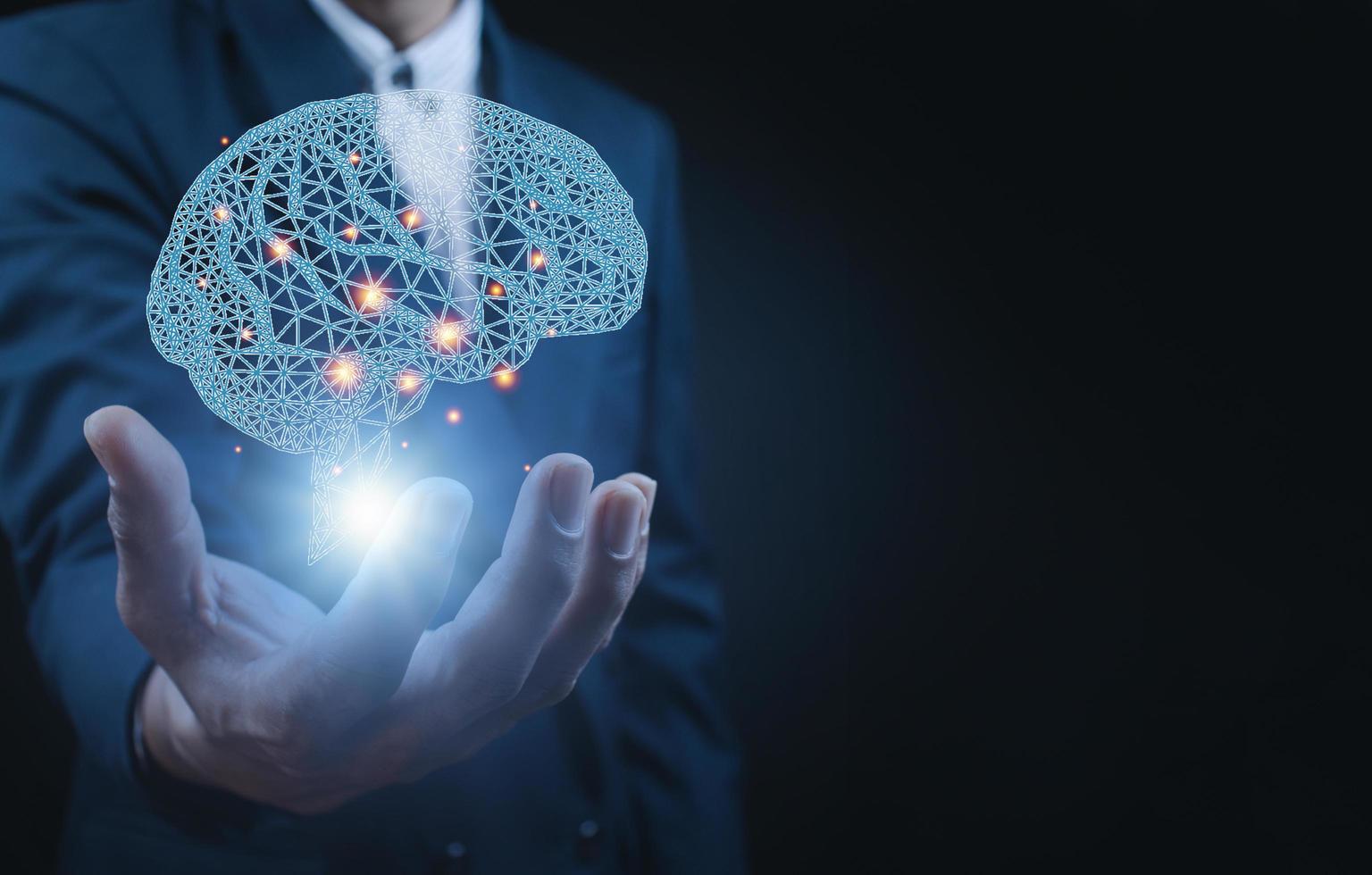 businessman holding digital image of brain. photo