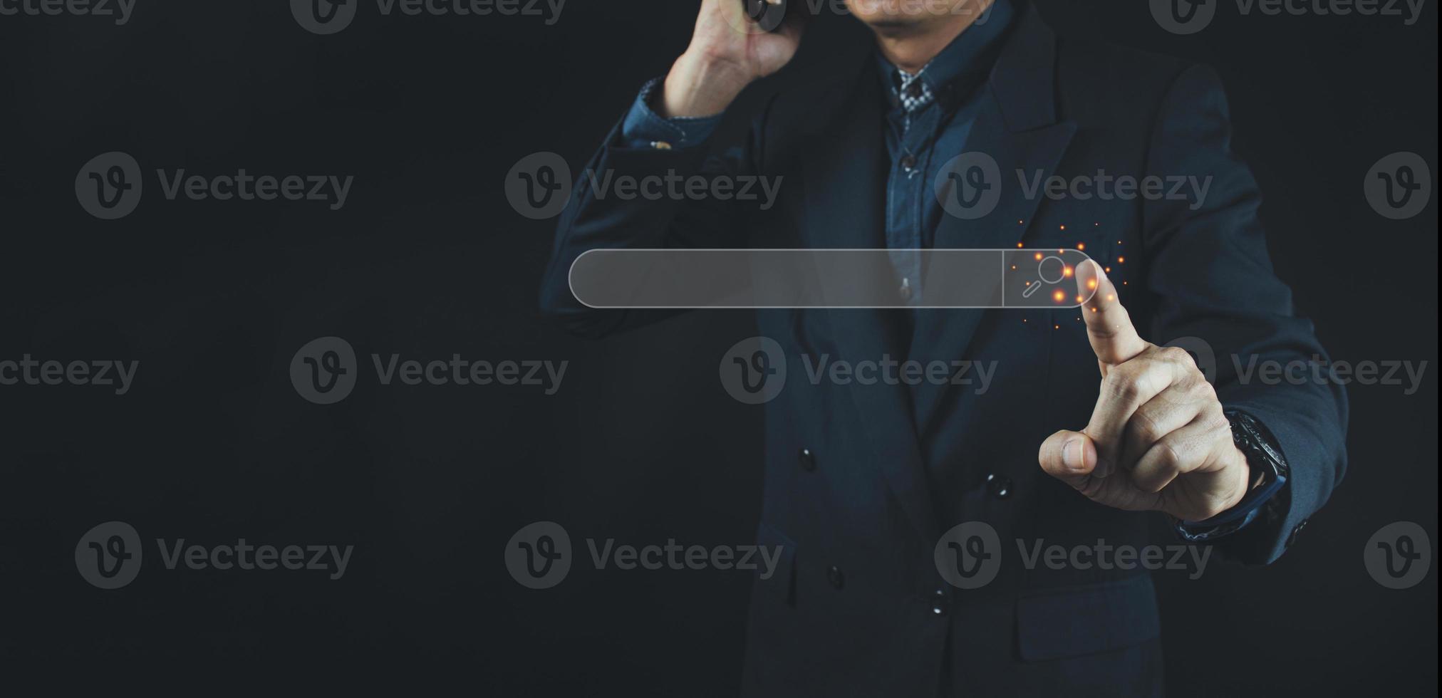 Businessman using phone searching Browsing Internet Data Information. photo