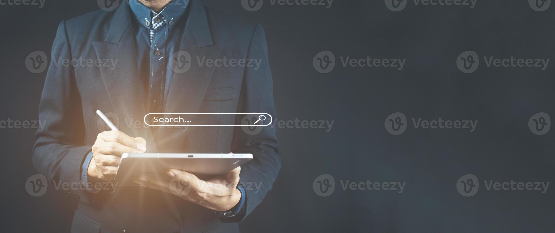 man's hands are using a computer notebook to Searching for information. photo