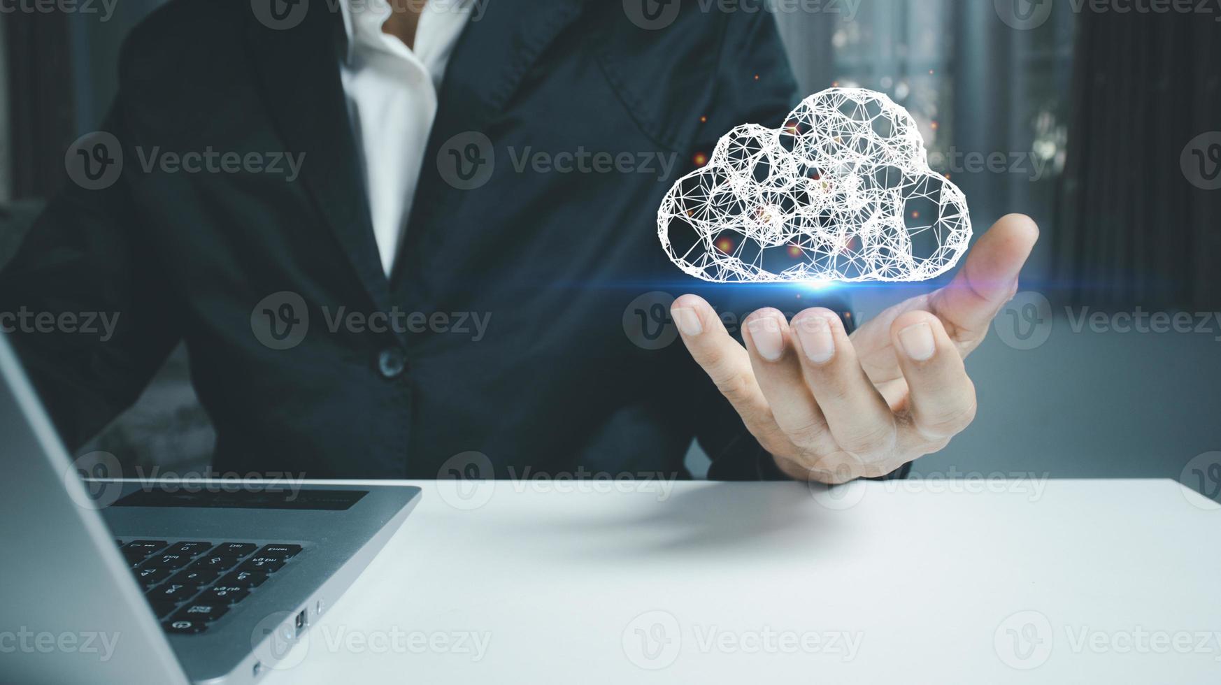 Businessman hold cloud icon.Cloud computing concept . photo