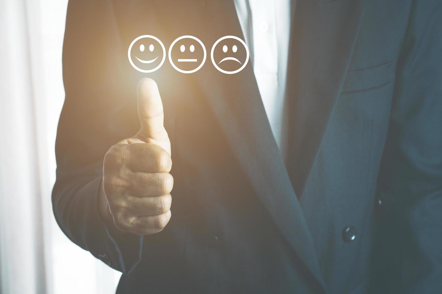 Businessman using thin line customer satisfaction rating photo