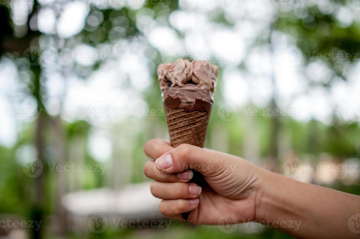 Hand pictures and chocolate ice cream, food concept with copy space photo