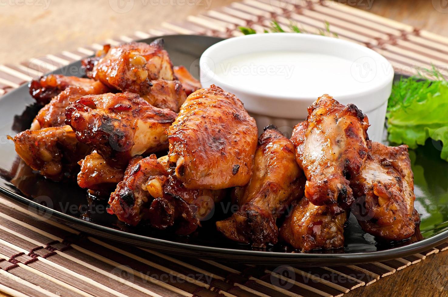 Baked chicken wings in the Asian style photo
