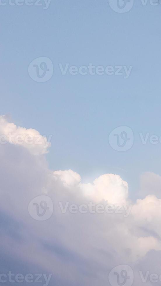 Blue sky with cloud background nature, vertical photo