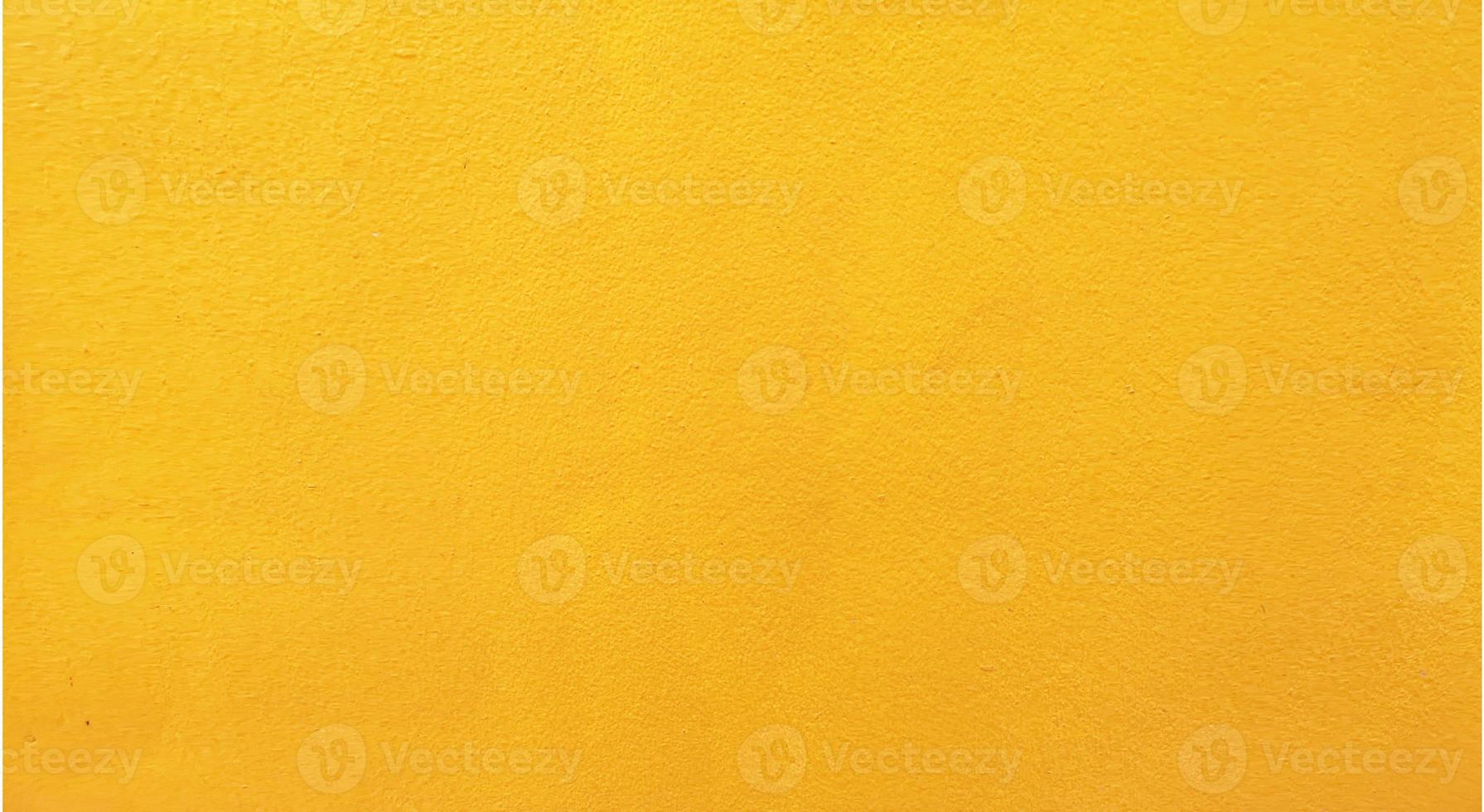 Abstract grunge and scratched technique yellow color concrete wall, cement smooth surface material texture background, Loft style vintage, retro backdrop, build Construction, decoration floor photo