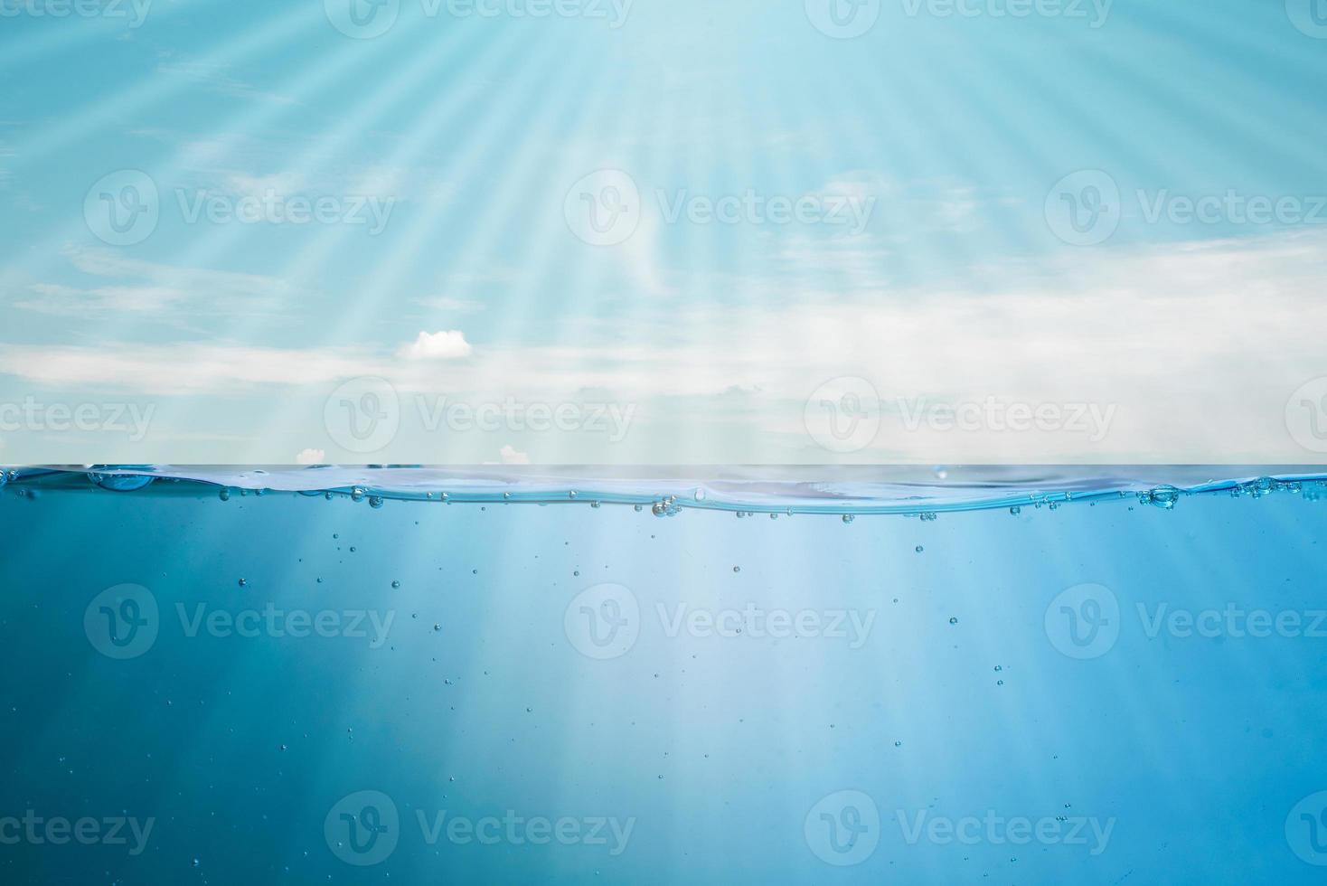 beautiful blue sea waves stopped steaming with separate bubbles on a white background. Popular corners, natural concepts photo