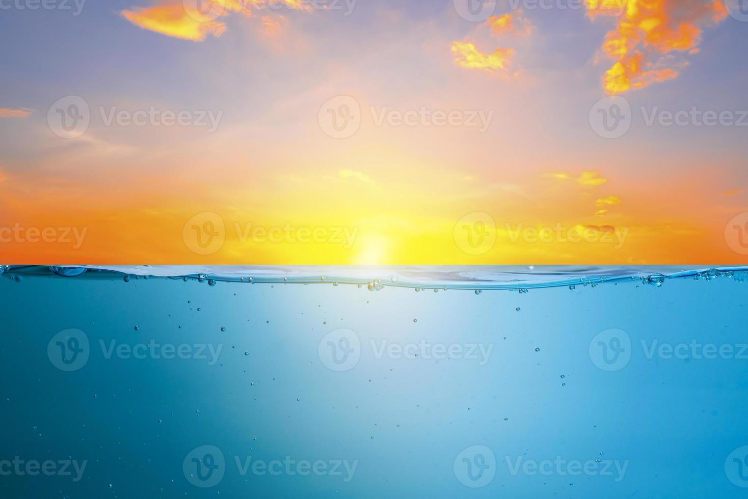 beautiful blue sea waves stopped steaming with separate bubbles on a white background. Popular corners, natural concepts photo