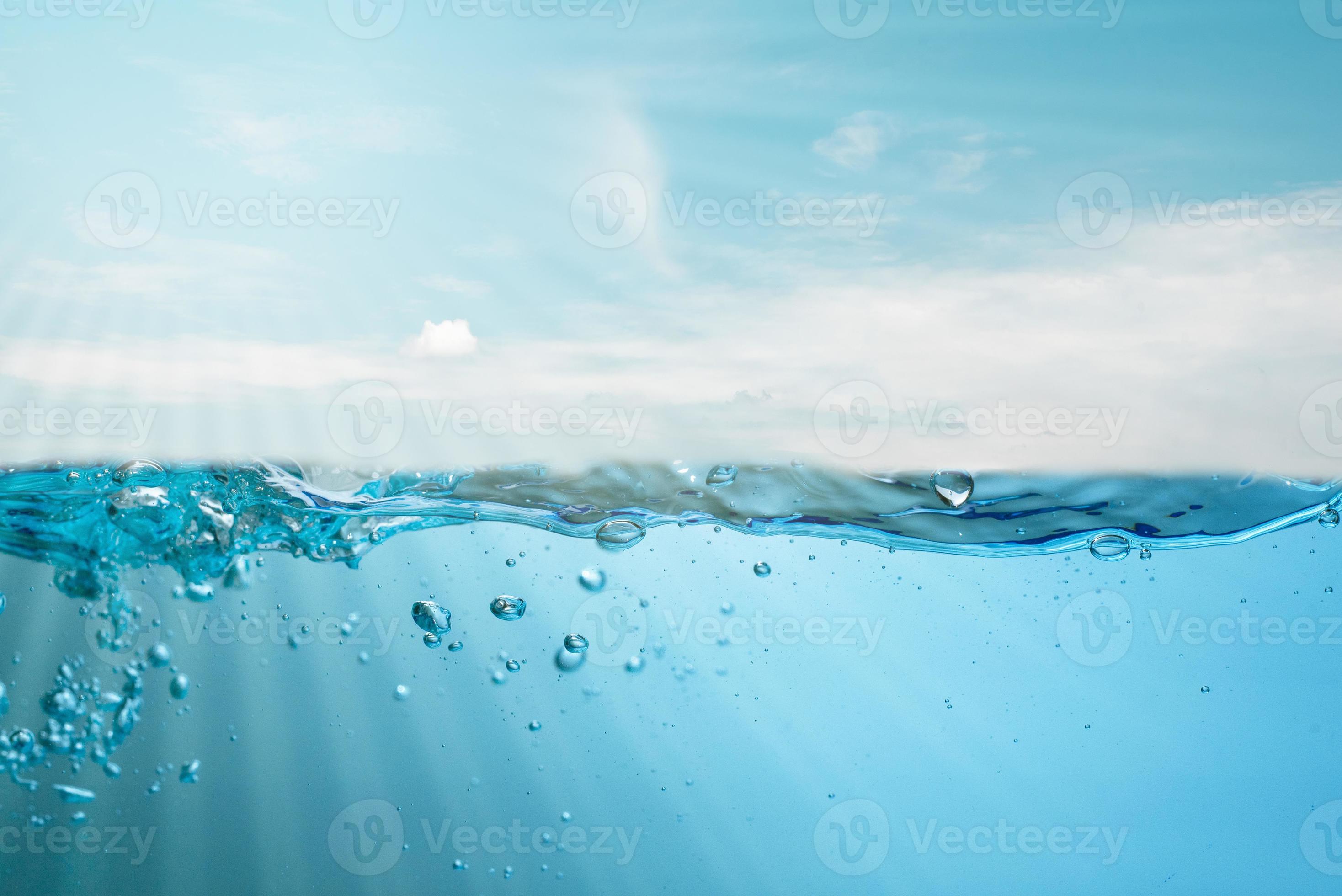 blue sea waves stopped steaming with separate bubbles on a white