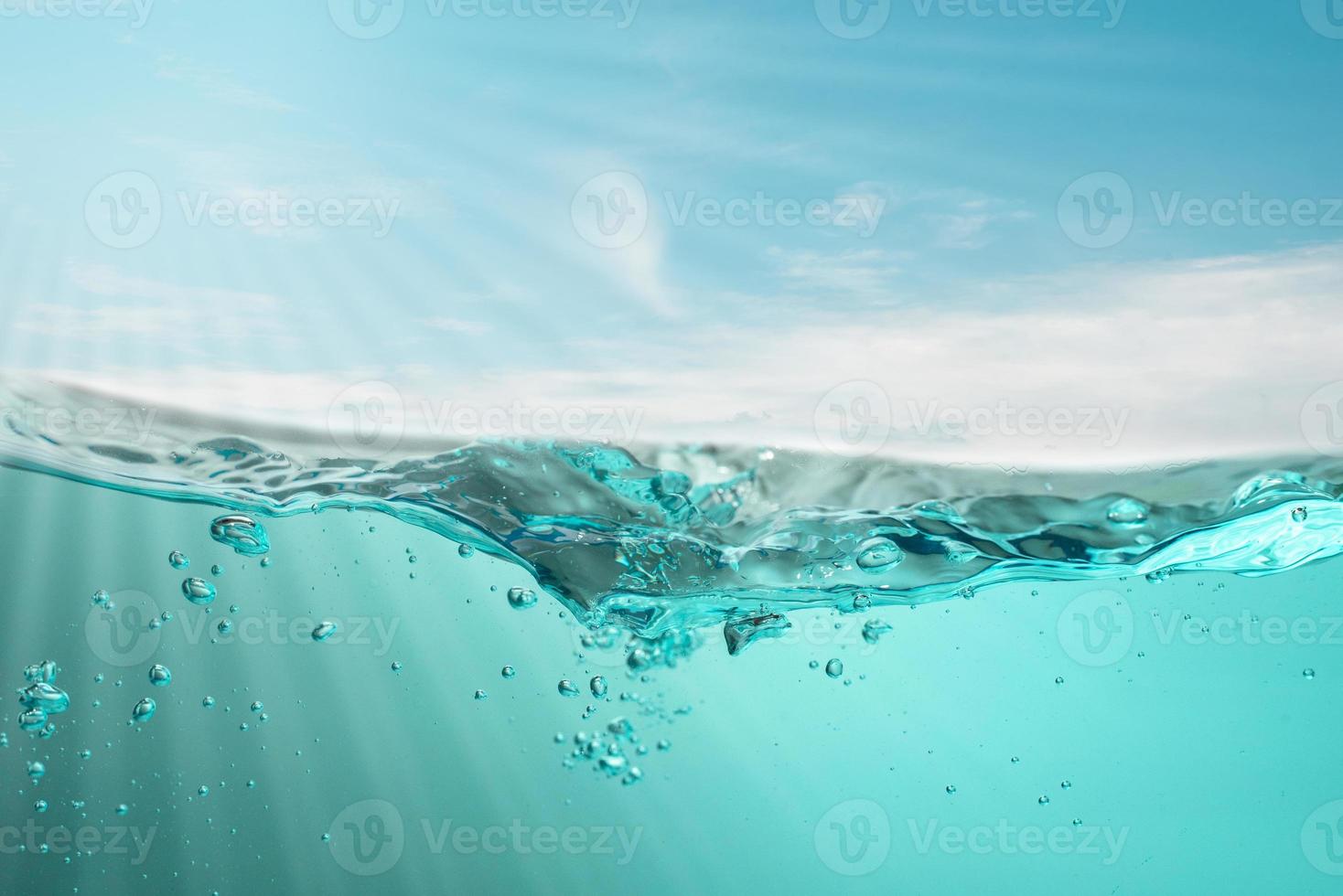 blue sea waves stopped steaming with separate bubbles on a white background. Popular corners, natural concepts photo