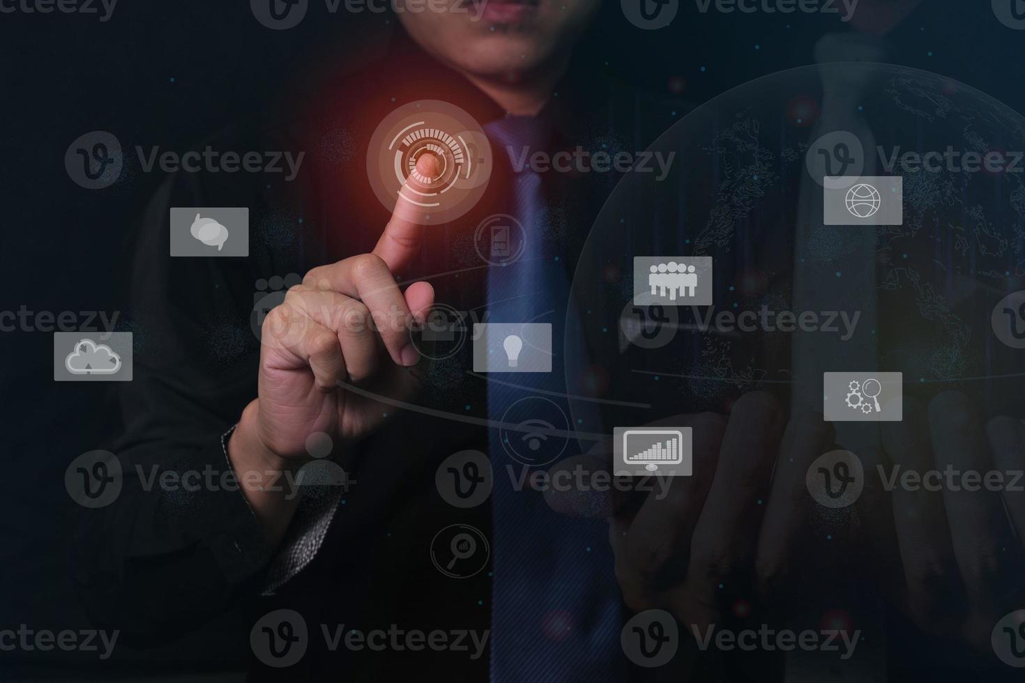 Businessman in black communicating work with virtual digital screen online. photo