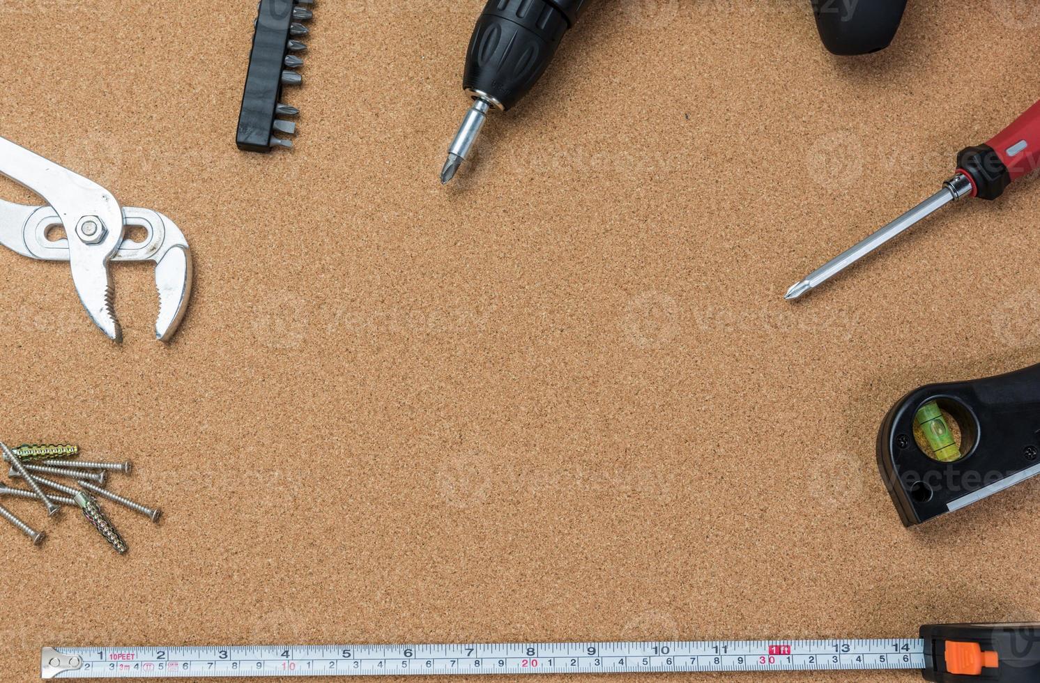 many handy tools, on wooden background top view with copy space for text, Labor day background photo