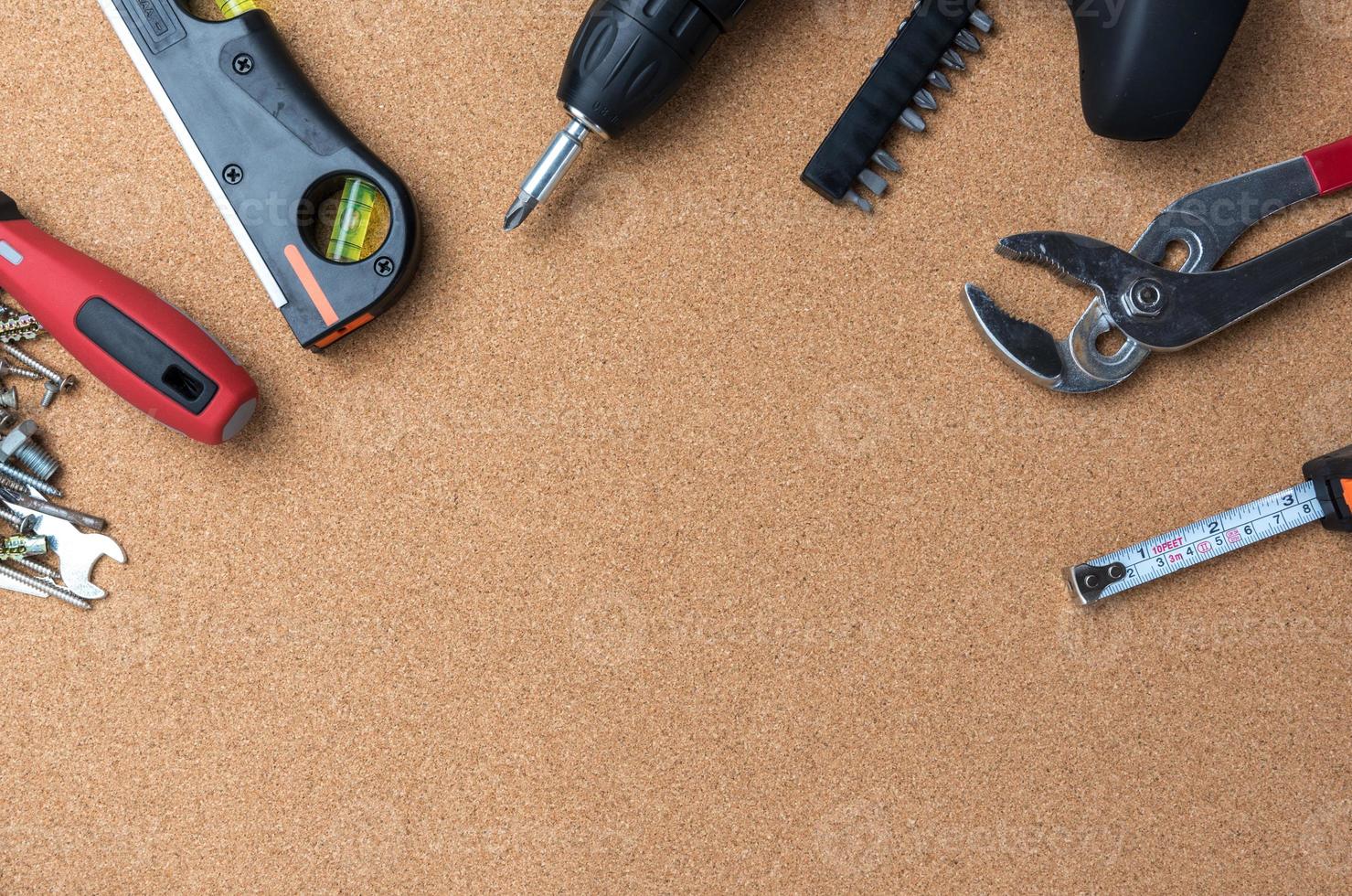 many handy tools, on wooden background top view with copy space for text, Labor day background photo