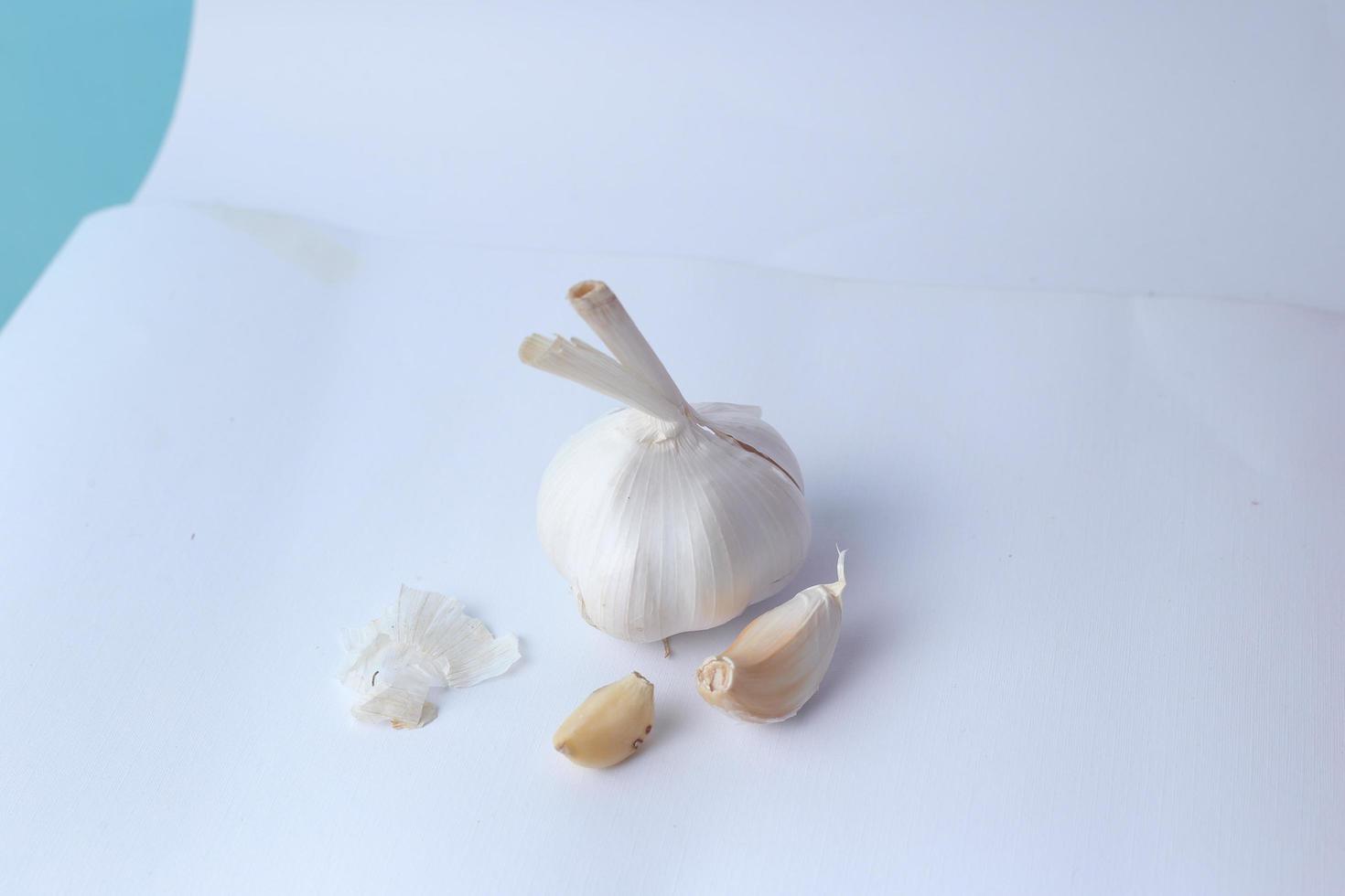 Garlic bulbs on white background, nice picture. Organic garlic top view. Food background. Selective focus. photo